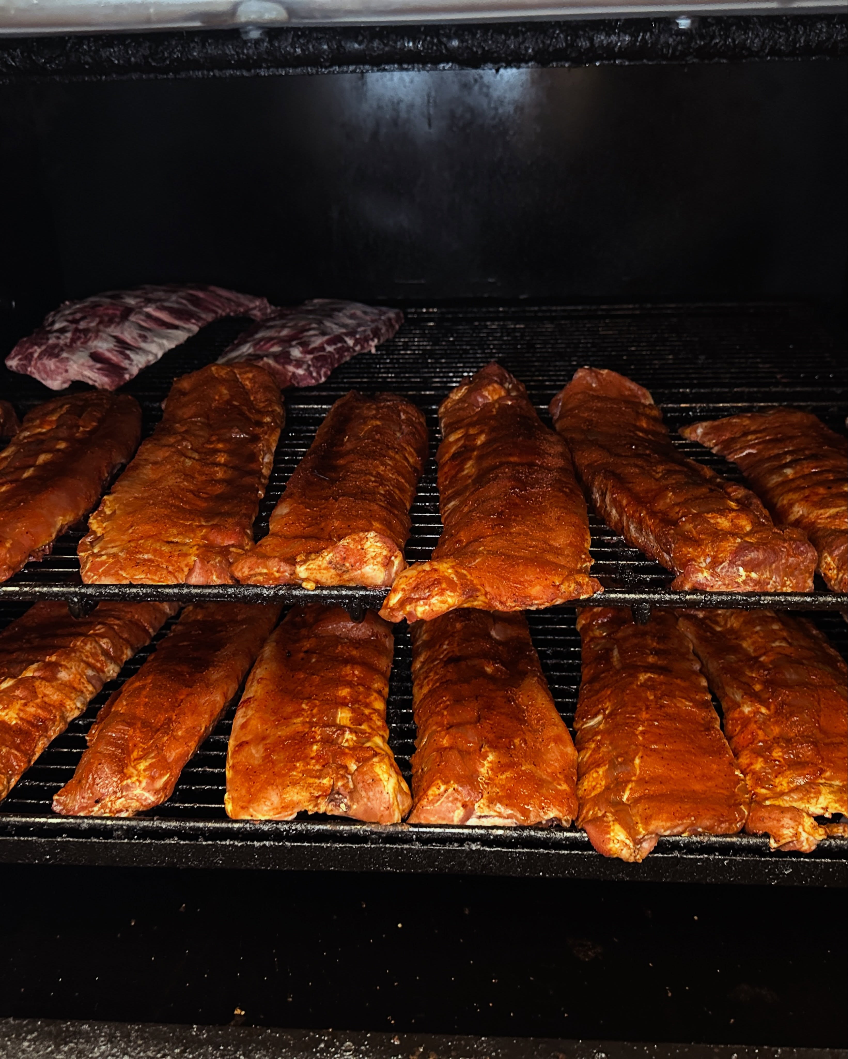 Ribs cooking inside the BubbaQue smoker